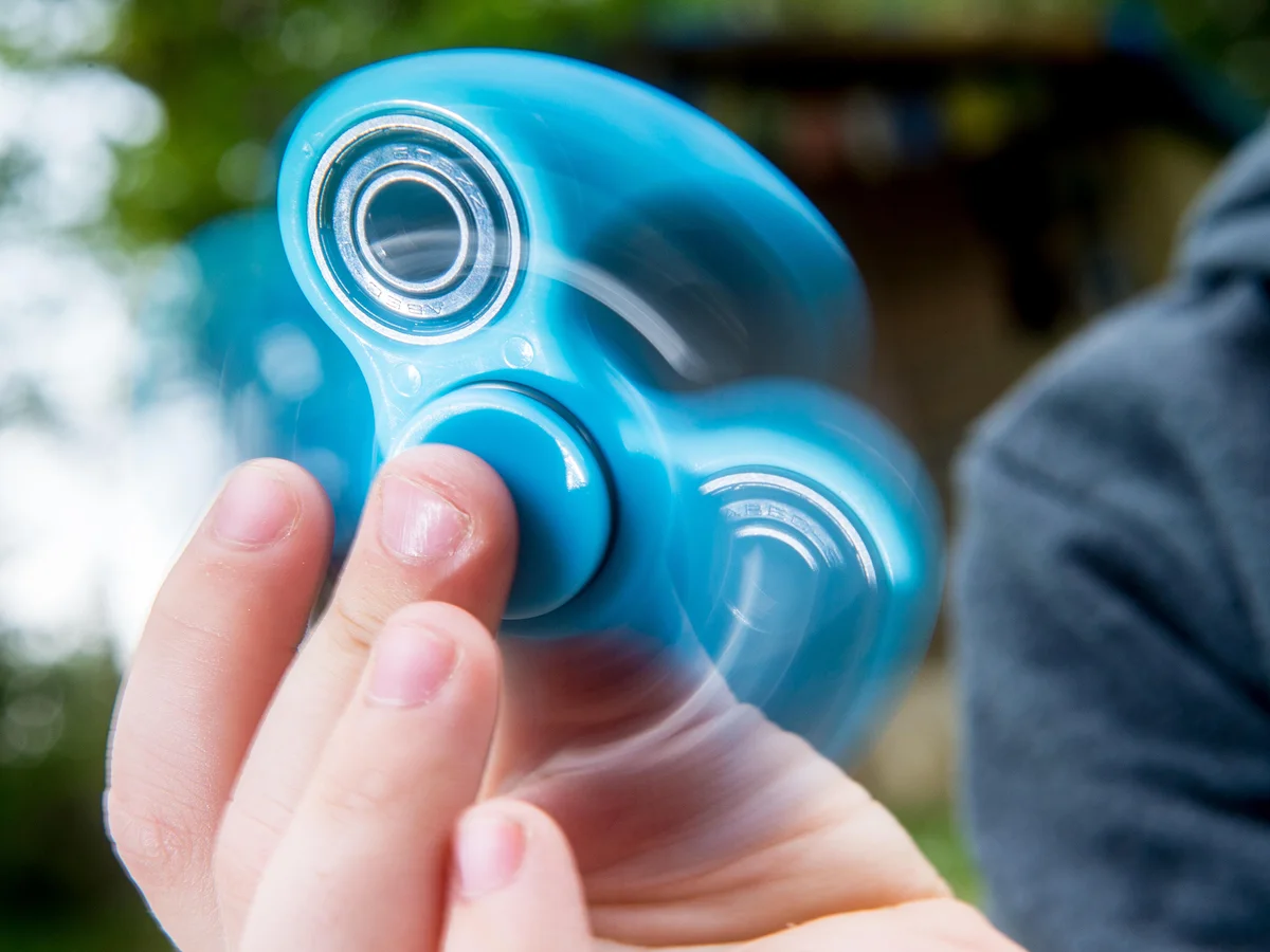 Customer unboxing custom Pop It fidget toys from LeelineToys