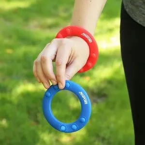 Children playing with branded fidget spinners at school