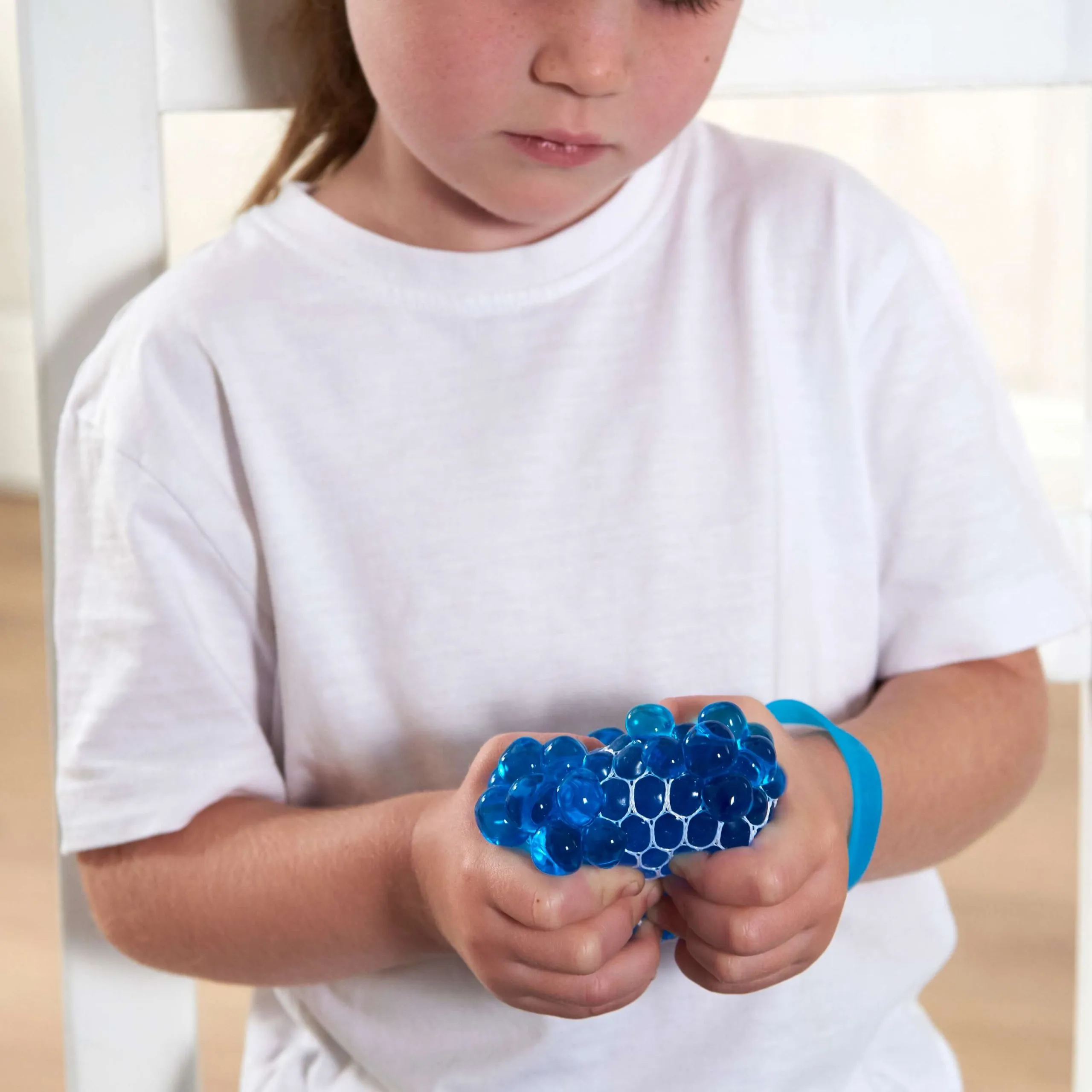 Attendee using custom fidget cube at trade show booth