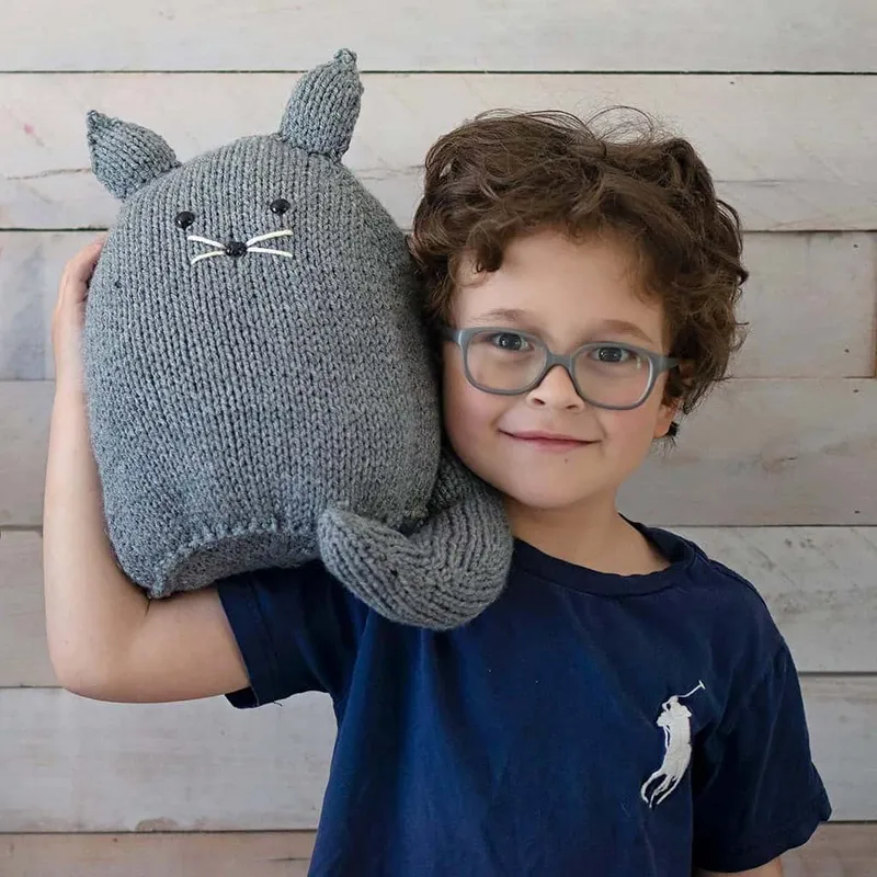 Custom knit teddy bear with personalized embroidered paw by LeelineToys