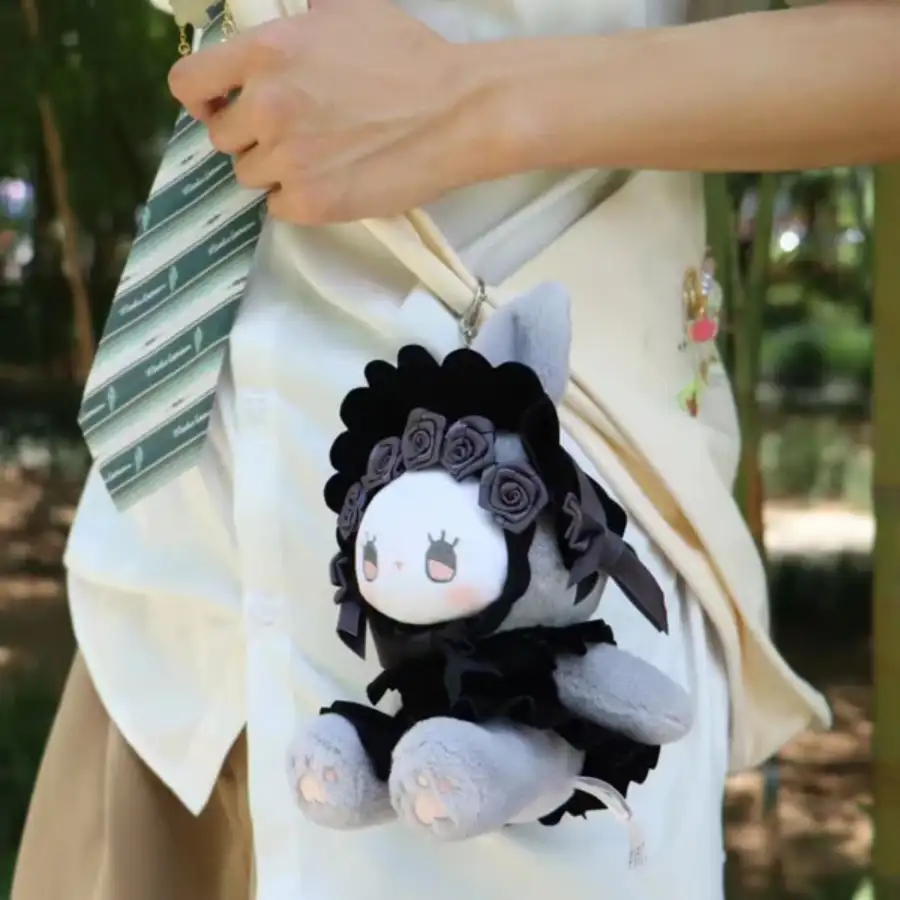 Client with custom shaped plush keychain in retail setting