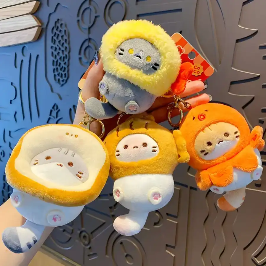Client holding branded plush keychain at trade show
