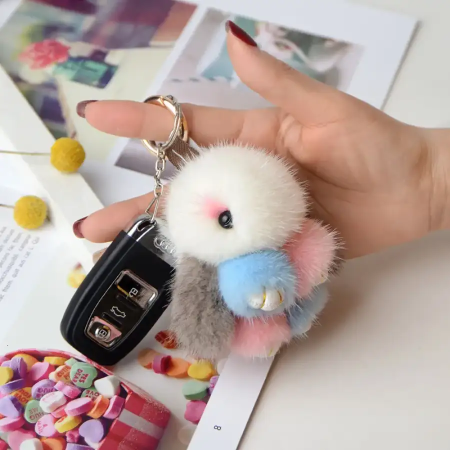 Client showcasing seasonal plush keychain collection