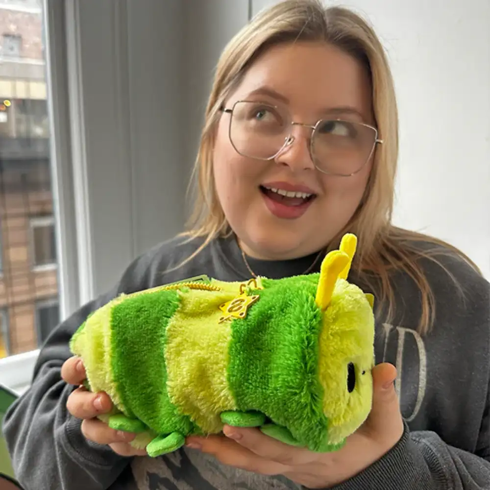 Happy customer with custom plush