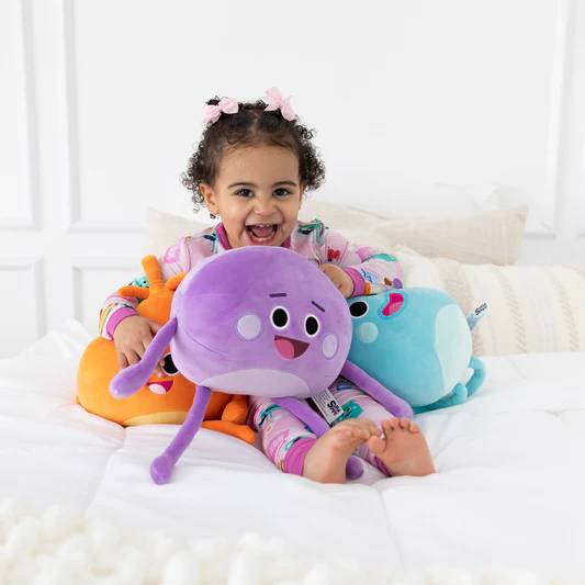 Customer photo with custom plush toy