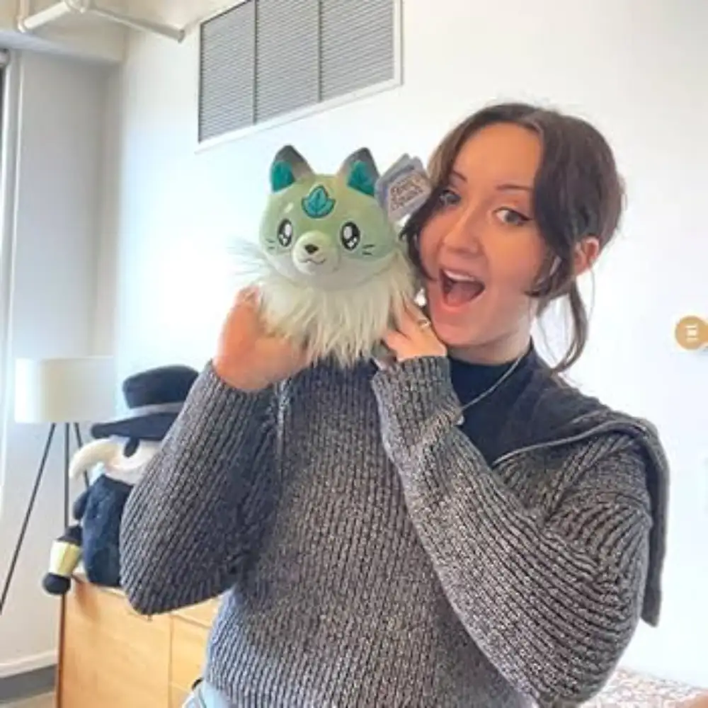 Customer holding custom plush toy