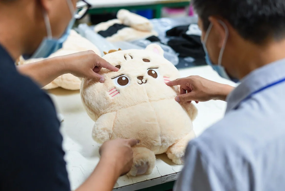 Plush toy revision — embroidery refinement and detail adjustment